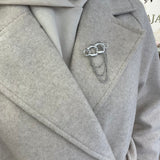 Broche Olympiade (existe en doré ou argenté )