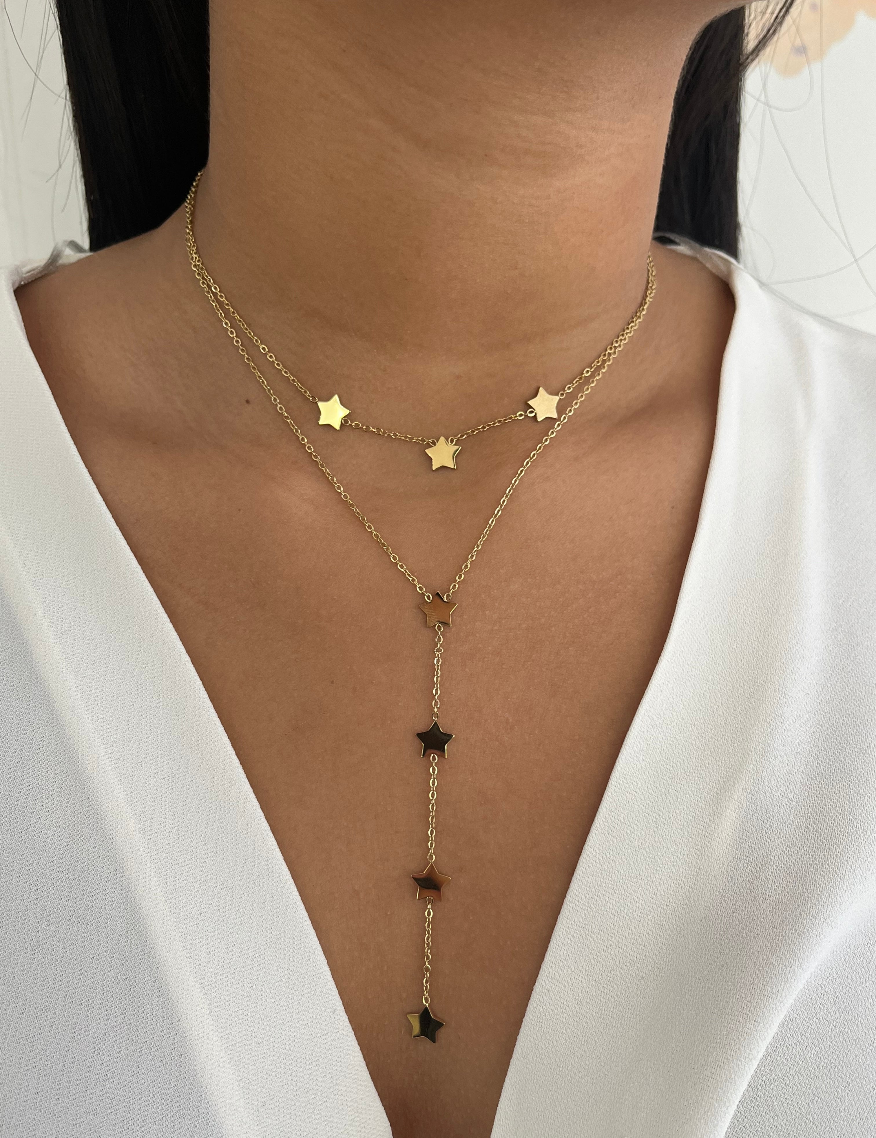 Collier Double Star doré à double rang d'étoiles dont un en Y, porté au cou - Ordiajade