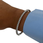 Bracelet jonc June argenté en acier inoxydable porté au poignet - Ordiajade