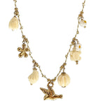 Collier doré en acier inoxydable avec pendentif oiseau et perles ivoire - sur fond blanc -Bijoux Ordiajade