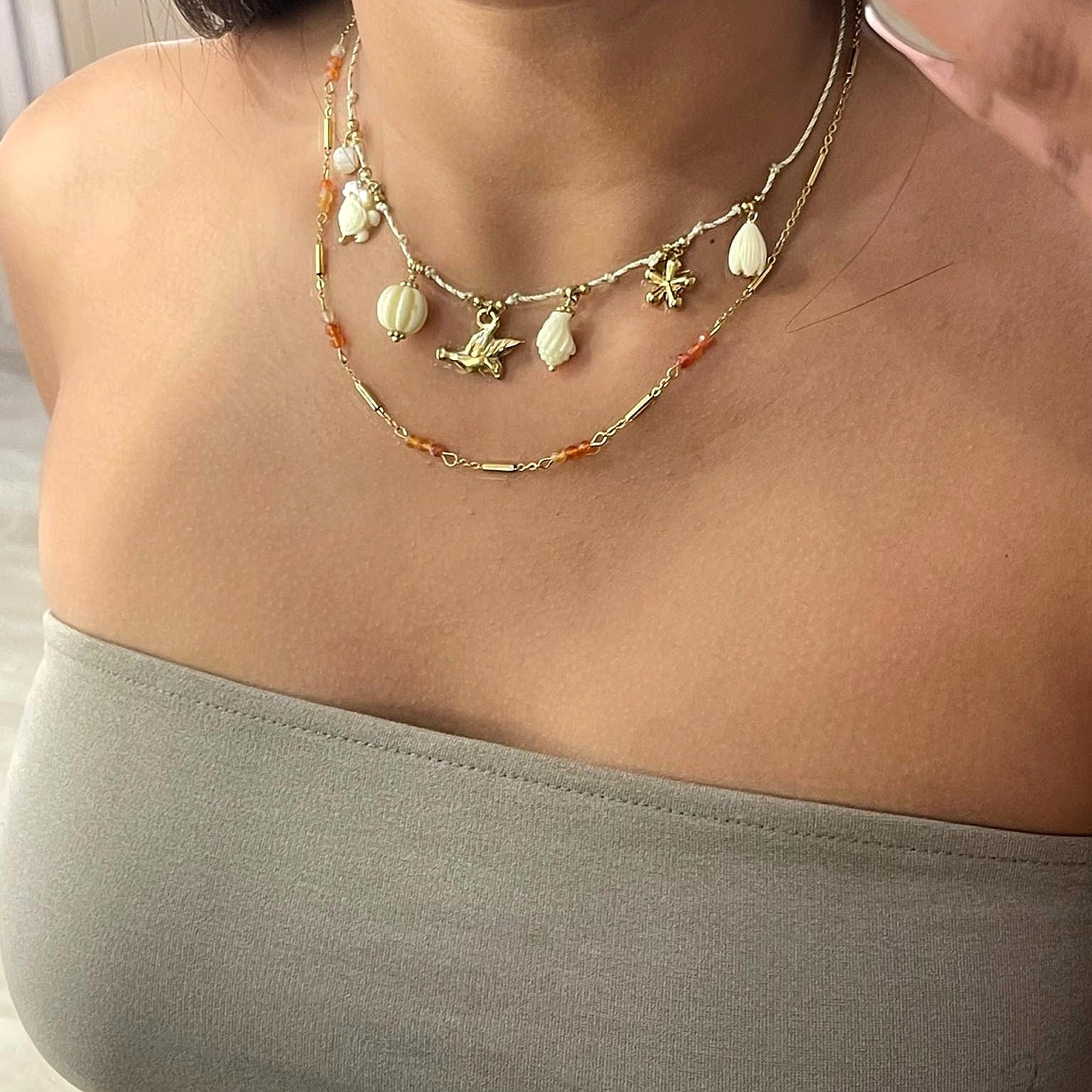 Collier doré en acier inoxydable avec pendentif oiseau et perles ivoire - Bijoux Ordiajade