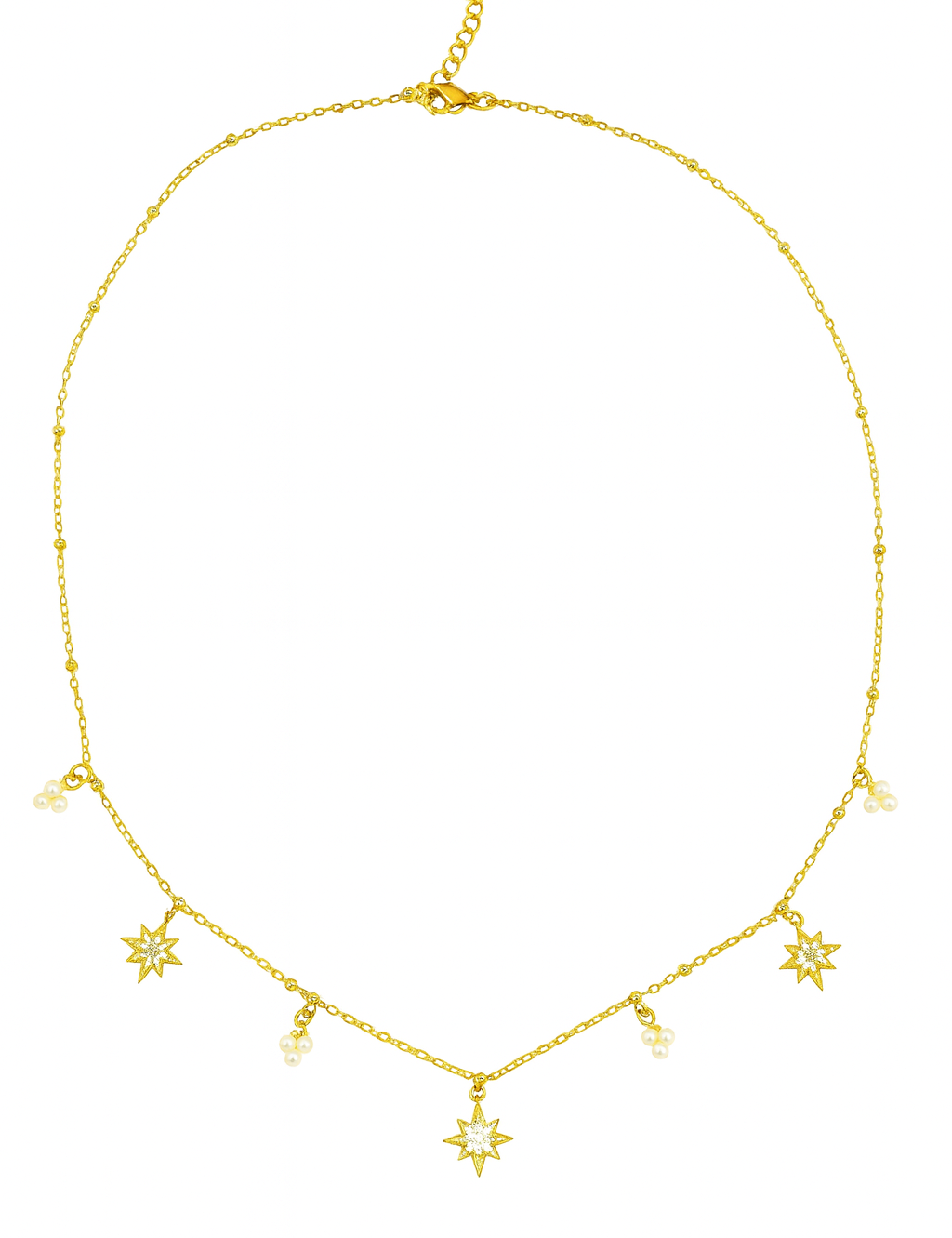 Collier doré à charms étoiles posé sur fond blanc – modèle Johanna
