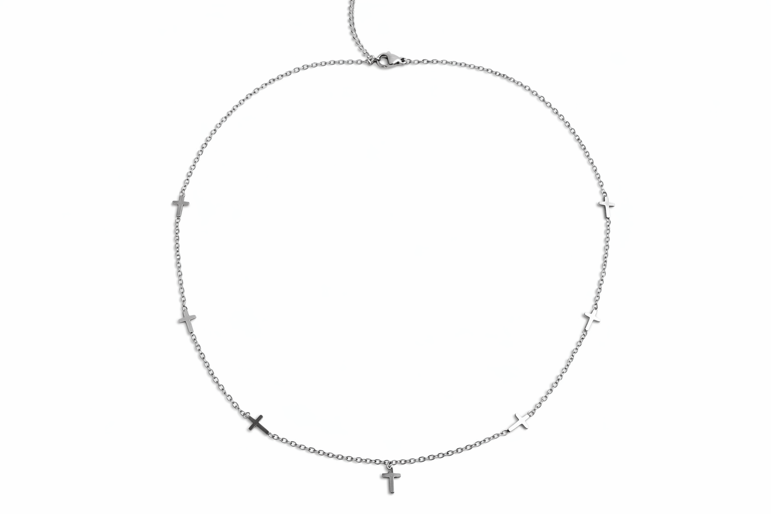 Collier Naya argenté en acier inoxydable, chaîne fine ponctuée de petites croix, sur fond blanc - Ordiajade