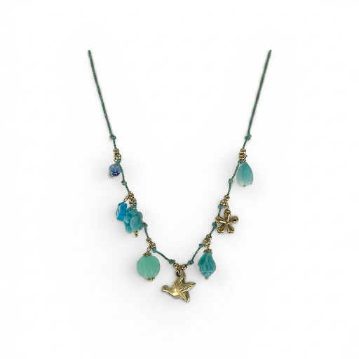 Collier Playa Bleu, cordon tressé à breloques bleues, fleurs et oiseau doré, sur fond blanc - Ordiajade