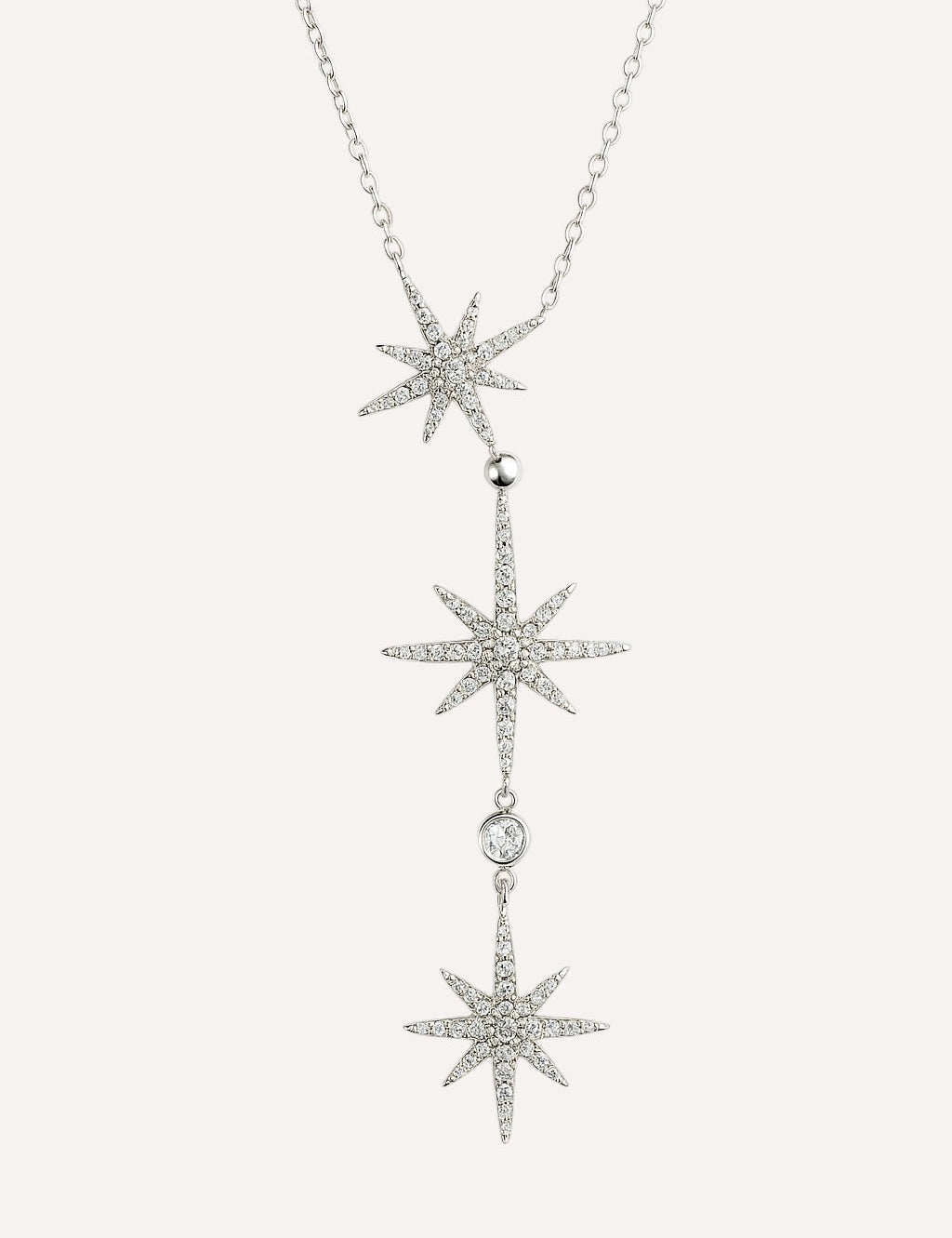 Collier Tempête Météores argenté en Y à trois étoiles pavées de strass, sur fond blanc - Ordiajade