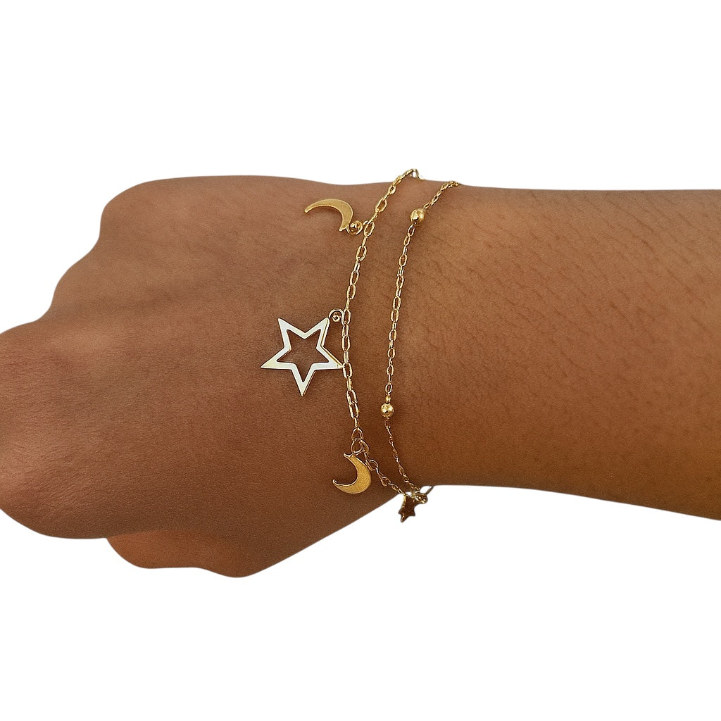 Bracelet Astre doré à étoile ajourée et petites lunes porté au poignet - Ordiajade