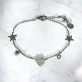 Pulsera Estrella Corazón (disponible en Oro o Plata)