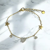 Pulsera Estrella Corazón (disponible en Oro o Plata)