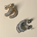 Paires de boucles d'oreilles demi-créoles Adonis dorées et argentées présentées à plat - Ordiajade