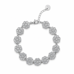 Bracelet argenté de style chaînette composé de médaillons ronds ciselés et pavés de strass brillants posé à plat - Ordiajade