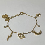 Bracelet Astral en acier inoxydable avec charms éclairs posé