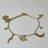 Bracelet Astral en acier inoxydable avec charms éclairs posé