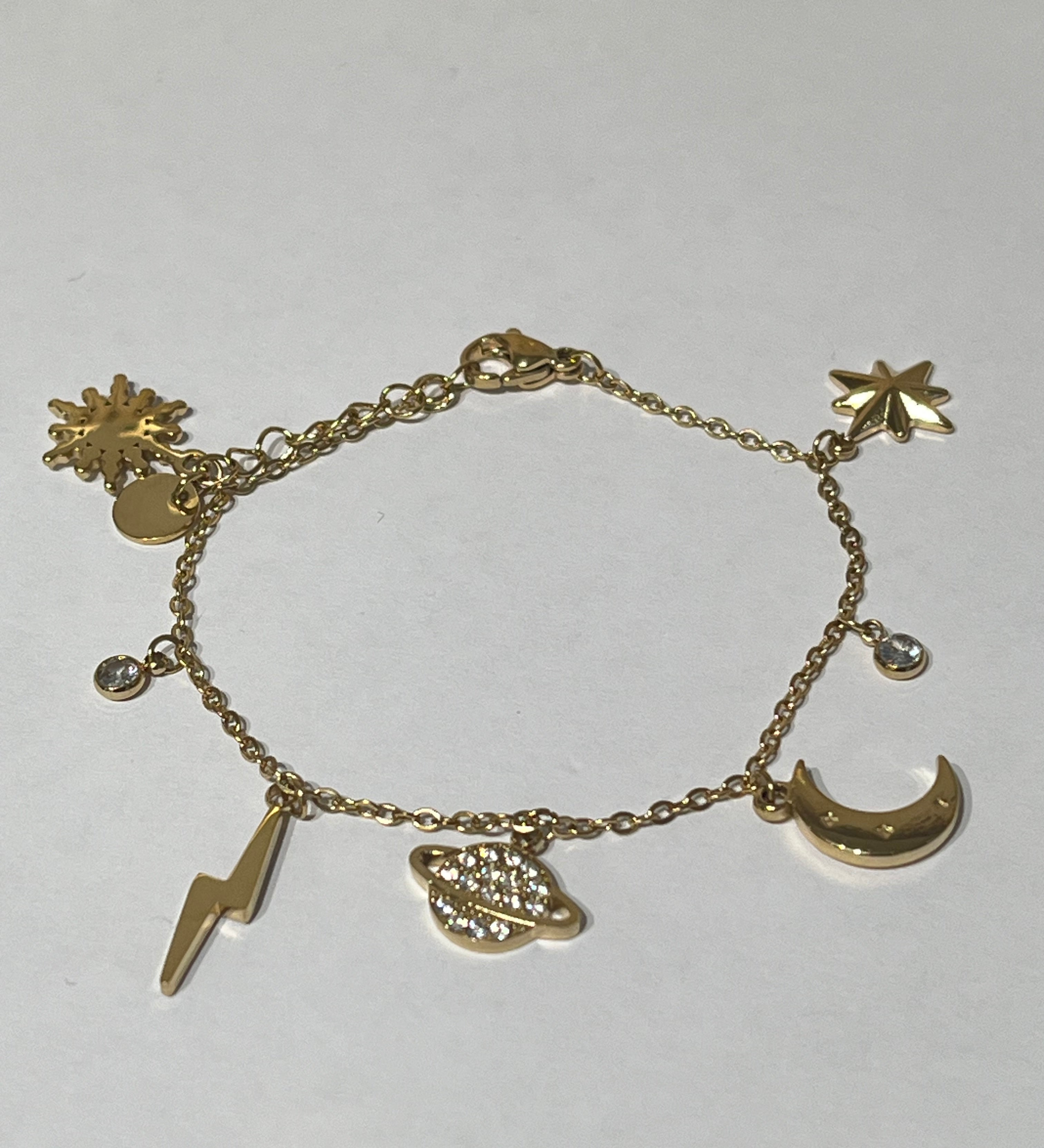 Bracelet Astral en acier inoxydable avec charms éclairs posé