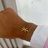 Bracelet Berber Origine en acier inoxydable doré avec symbole Amazigh porté au poignet - Ordiajade