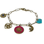 Bracelet à maillons dorés avec breloques cœur, croissant de lune et soleil.