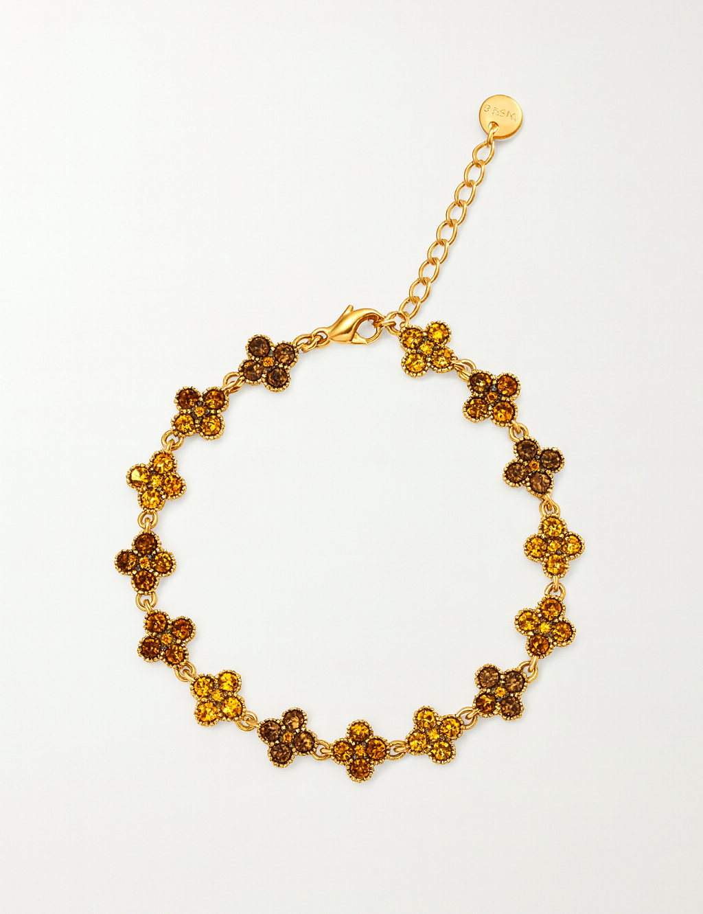 Bracelet Hailey Brown doré à motifs fleurs, style raffiné.