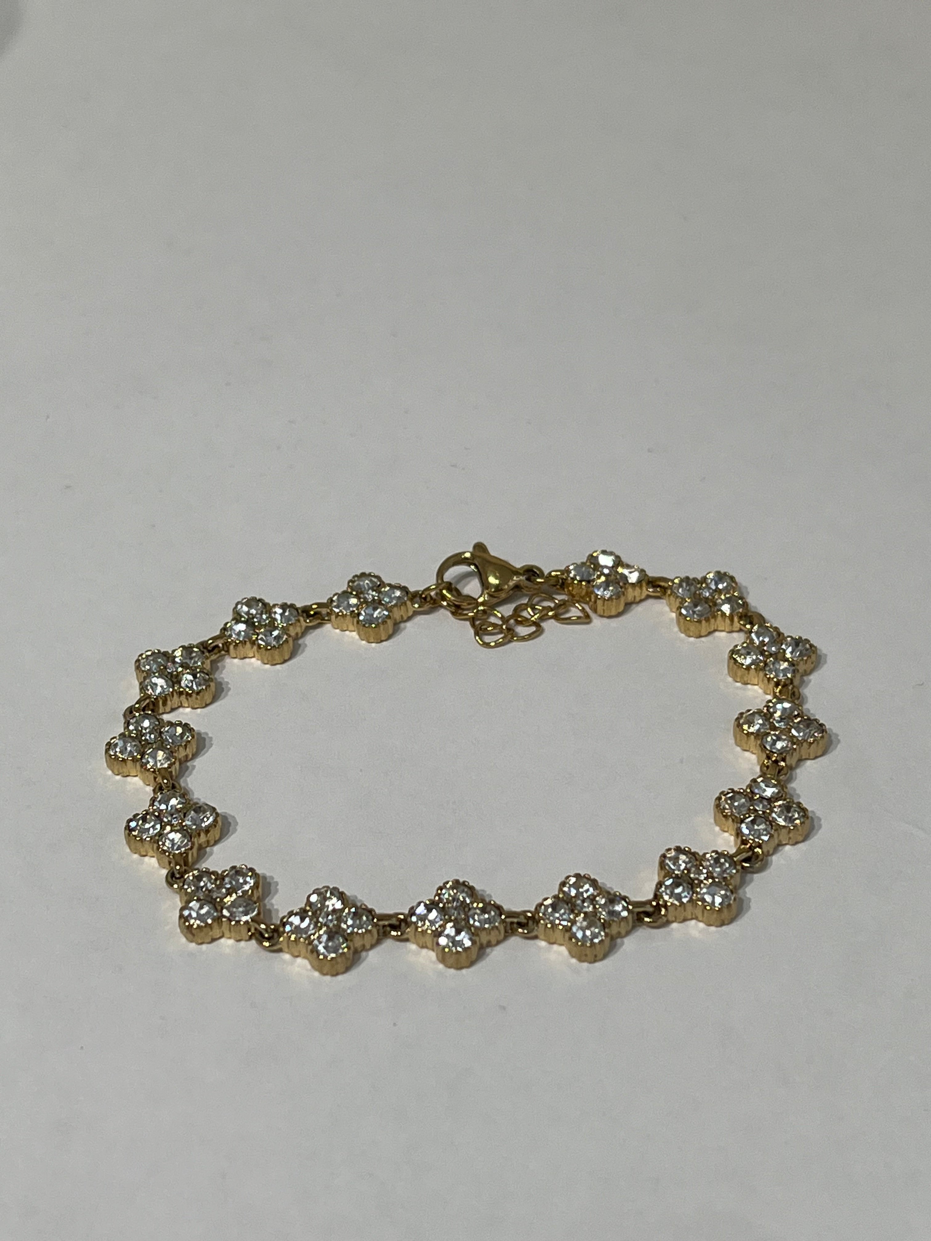 Bracelet Hailey doré à motifs fleurs serties sur fond neutre - Ordiajade