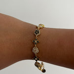 Bracelet IMPÉRATRICE BLACK doré avec détails noirs, bijou ajustable en acier inoxydable