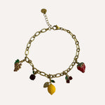 Bracelet Lila en acier inoxydable doré avec pampilles breloques fruits colorés - Ordiajade
