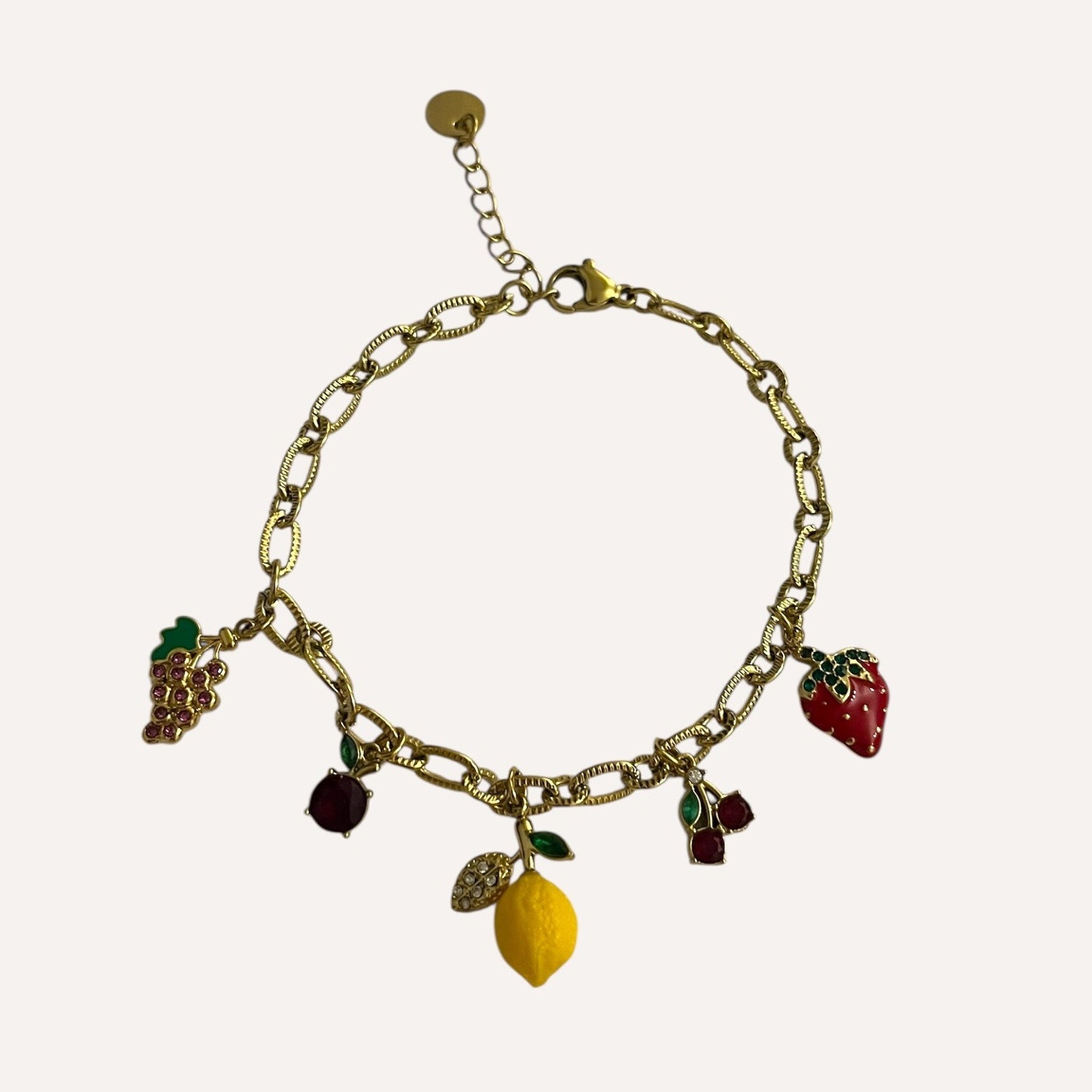Bracelet Lila en acier inoxydable doré avec pampilles breloques fruits colorés - Ordiajade
