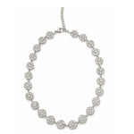 Collier  nacri argenté en acier inoxydable avec rangée de petites fleurs blanches posé en cercle à plat - Ordiajade