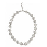 Collier  nacri argenté en acier inoxydable avec rangée de petites fleurs blanches posé en cercle à plat - Ordiajade