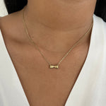 Collier doré à pendentif nœud délicat en acier inoxydable porté au cou - Ordiajade