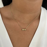 Collier doré à pendentif nœud délicat en acier inoxydable porté au cou - Ordiajade