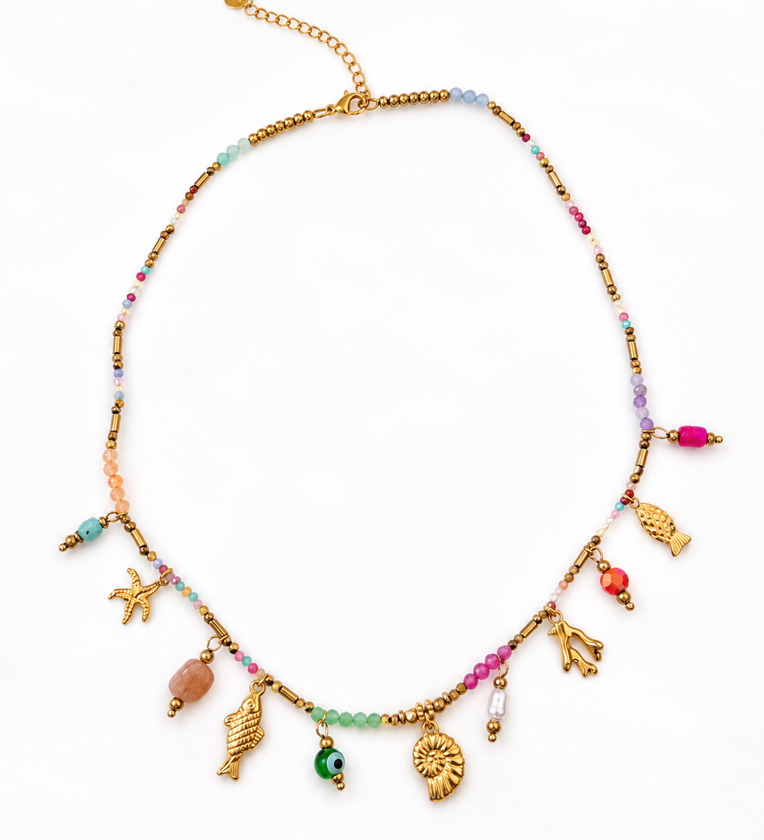 Collier fin doré Sea en acier inoxydable avec pampilles coquillage et étoile de mer posé à plat - Ordiajade