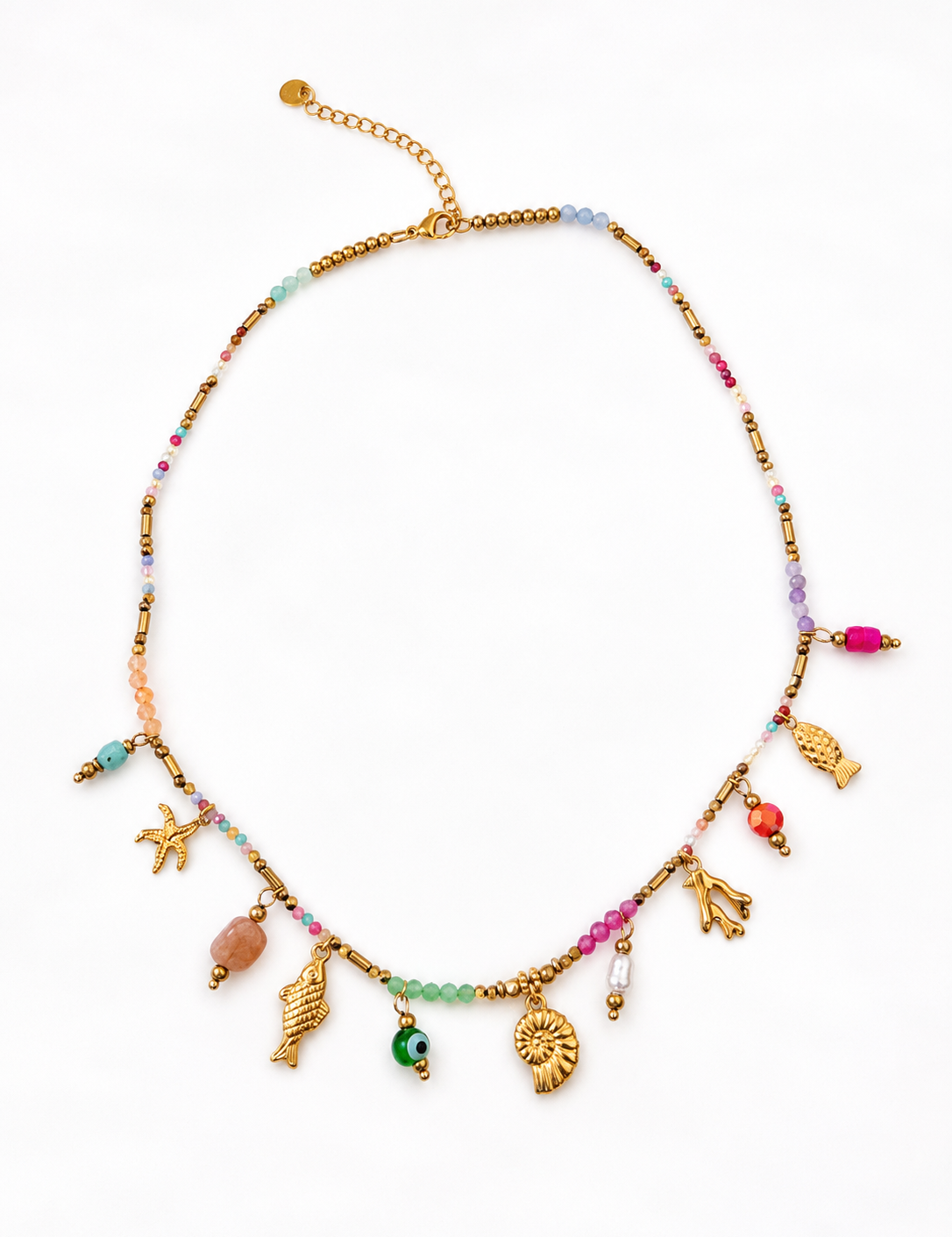 Collier fin doré Sea en acier inoxydable avec pampilles coquillage et étoile de mer posé à plat - Ordiajade