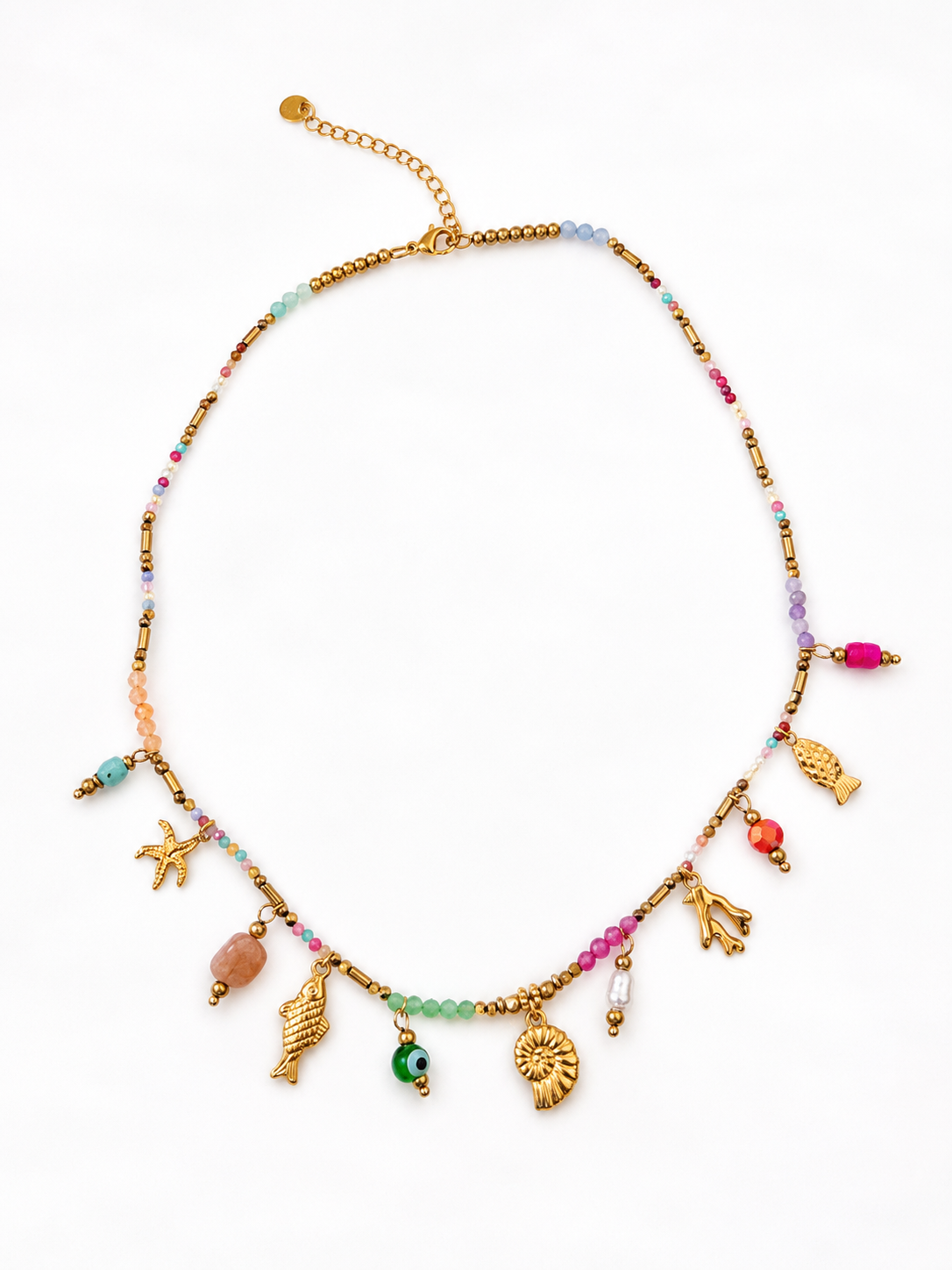 Collier fin doré Sea en acier inoxydable avec pampilles coquillage et étoile de mer posé à plat - Ordiajade