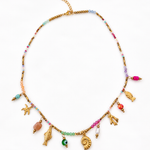 Collier fin doré Sea en acier inoxydable avec pampilles coquillage et étoile de mer posé à plat - Ordiajade