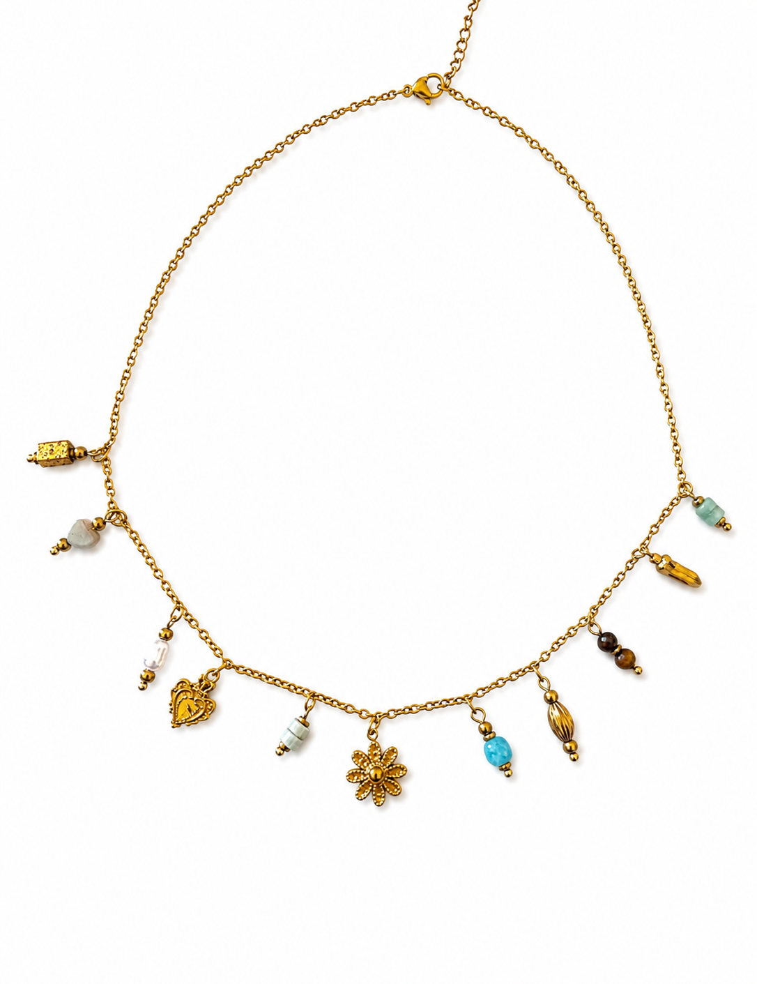 Collier fin doré Jade en acier inoxydable orné de breloques suspendues et petites pierres naturelles bleues posé à plat - Ordiajade