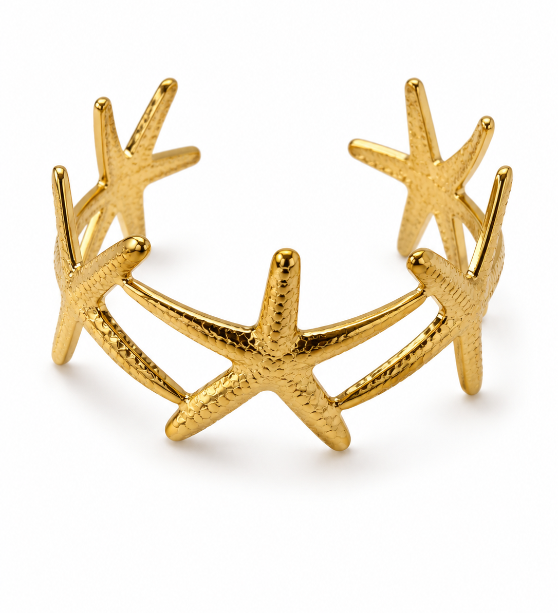 Bracelet manchette doré Odysse ajouré avec motifs étoiles de mer en acier inoxydable - Ordiajade