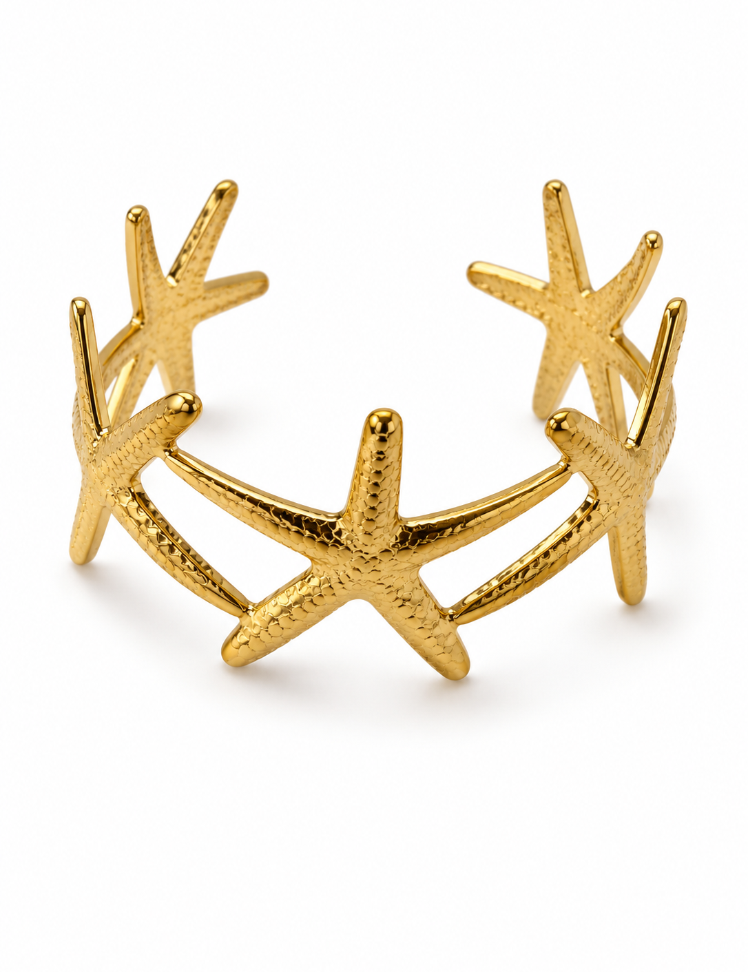 Bracelet manchette doré Odysse ajouré avec motifs étoiles de mer en acier inoxydable - Ordiajade