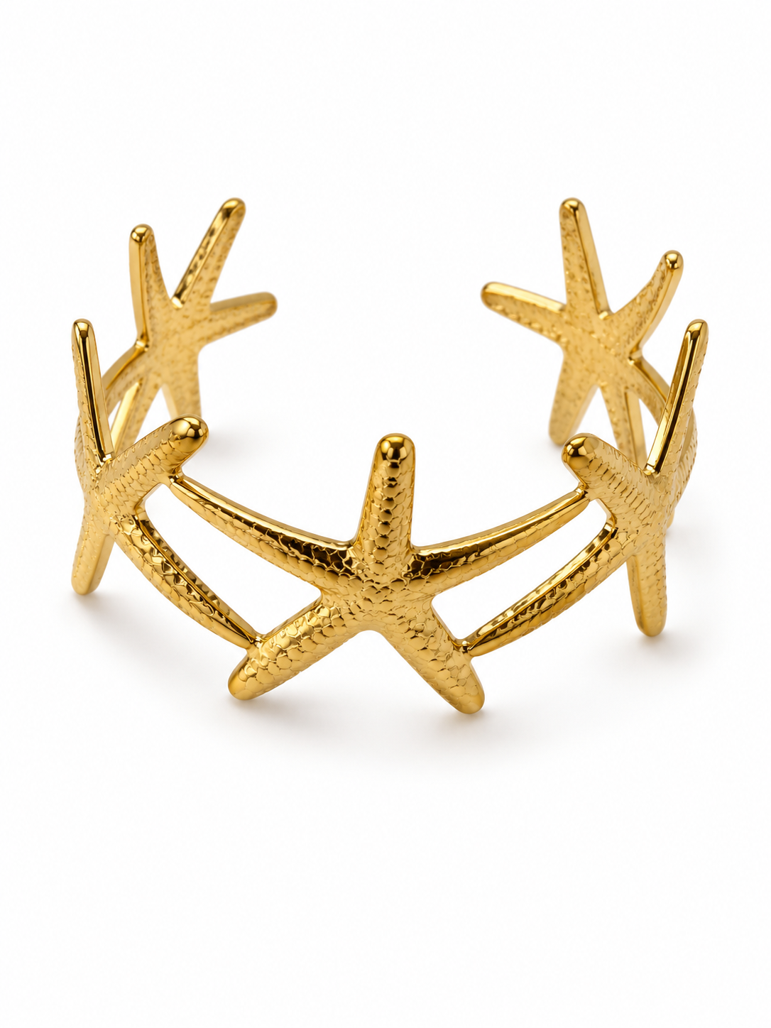 Bracelet manchette doré Odysse ajouré avec motifs étoiles de mer en acier inoxydable - Ordiajade